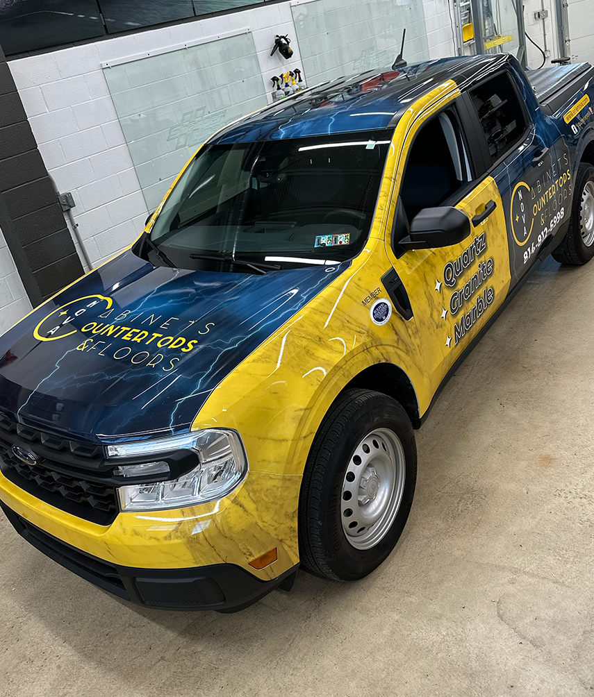 Installing viny lettering and graphics on a truck